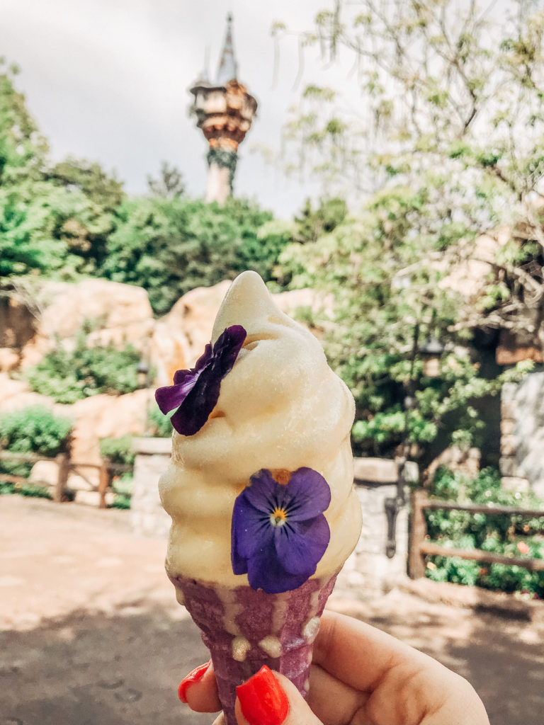 The ultimate snack guide to the best Disney food at the Disney Parks! Sharing over 50 Walt Disney World and Disneyland snacks that you must try on your next Disney trip. Head to the blog to read all my favorite Disney desserts and treats, from classic snacks like the Dole Whip and Mickey’s Premium Bar to hidden gems like the Citrus Swirl Float and Night Blossom. #disneysnacks #disneyfood #disneyeats