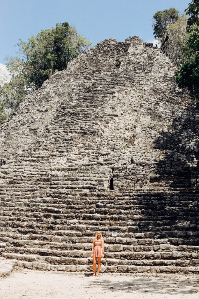 Explore Coba Mexico with me and learn everything you need to know about visiting these magical Coba Tulum Mayan Ruins in the Yucatan Peninsula. This lesser-know site is one of the true hidden gems of Mexico and has the Coba pyramid, the only pyramid that you can still climb in the Yucutan. Enjoy a trip to the Coba Ruins in Mexico that is much more relaxed and less touristy than neighboring ruins (like Chichen Itza without the crowds). I'll share historical knowledge to know before you go, admission prices, the best way to get around the site, what to wear and more! #cobamayanruins #cobatulum #cobapyramid #cobamexico #cobaruinsmexico #cobaruins
