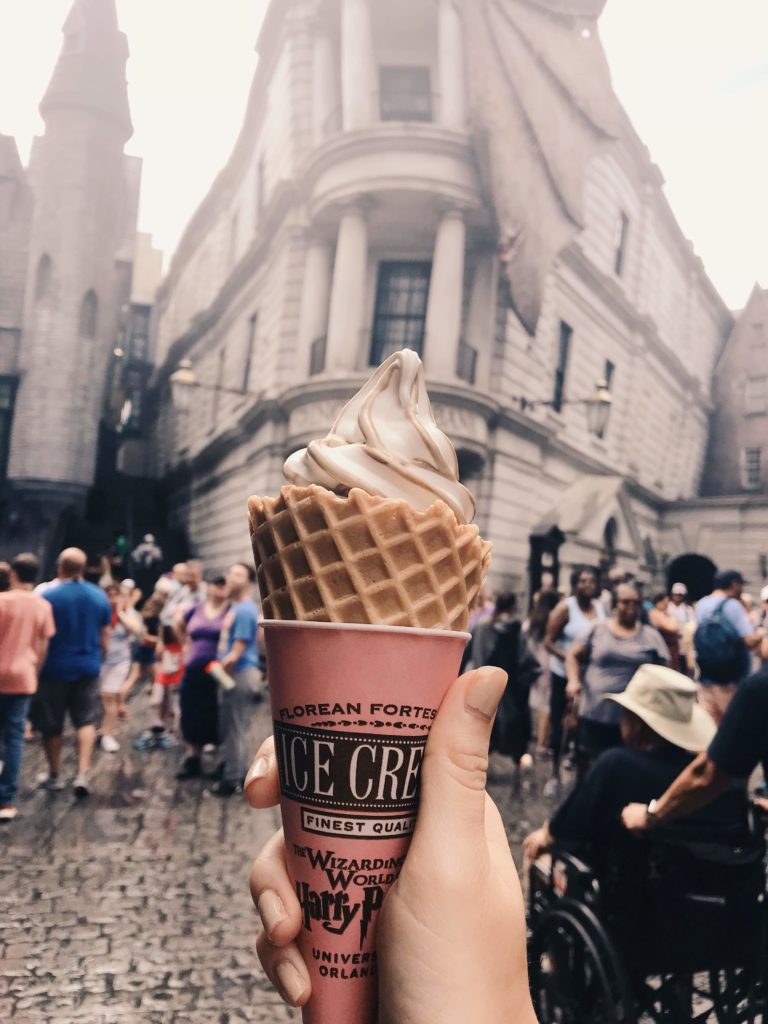 Detail shot of Butterbeer Ice Cream from Florean Fortescue's Ice-Cream Parlour with Gringotts Wizard Bank in the background