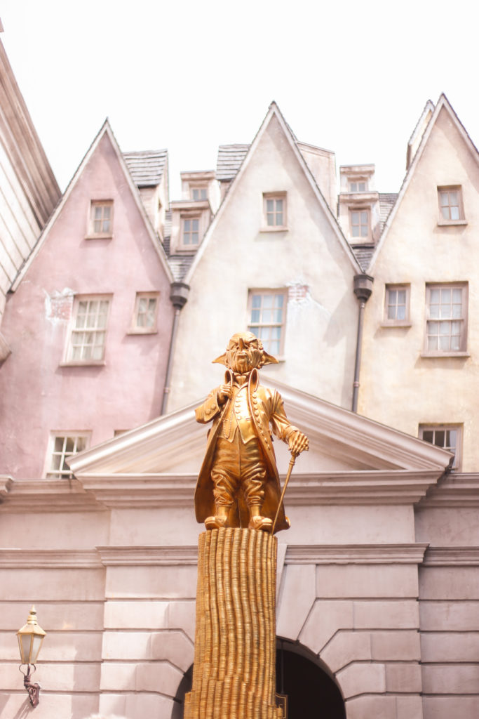 Golden goblin statue at the entrance to Harry Potter and the Escape From Gringotts