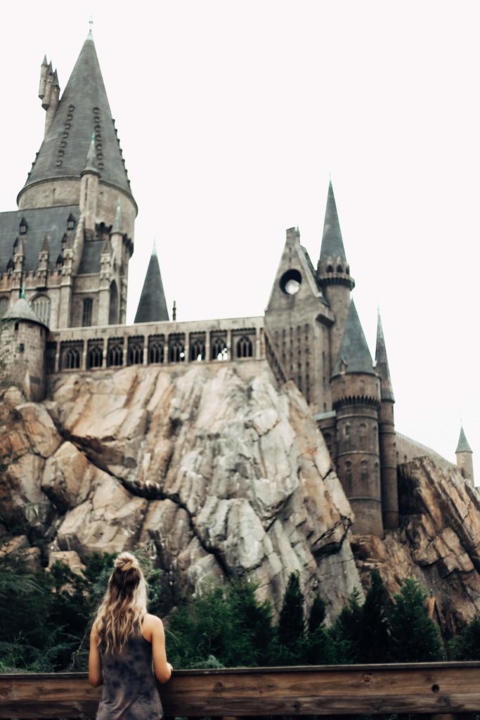 Girl overlooking a bridge to Hogwarts at Universal Orlando's Islands of Adventure