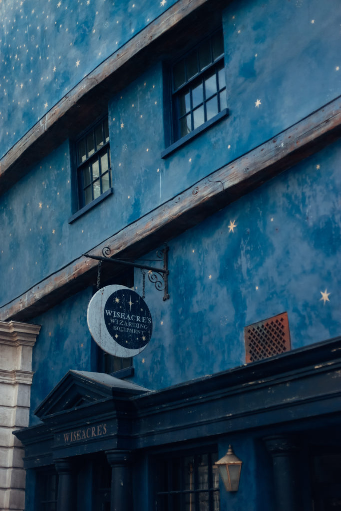 Blue starry shop facade of Wiseacre's Wizarding Equipment