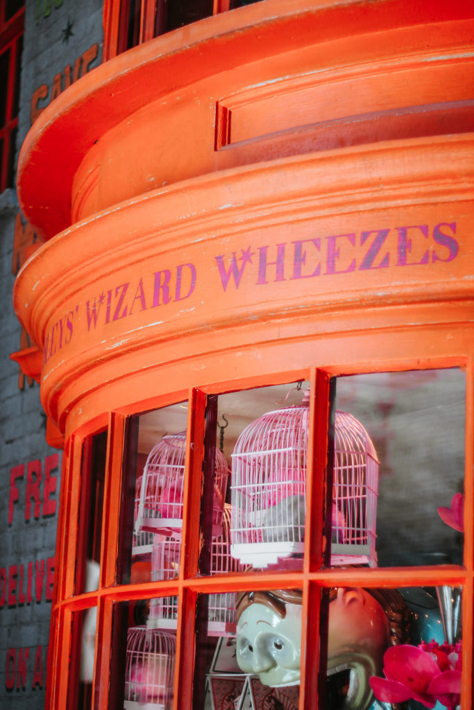 Orange store window of Weasley's Wizard Wheezes