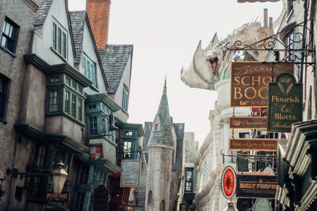 A dragon looks over the roofline of Diagon Alley at Universal Orlando Resort